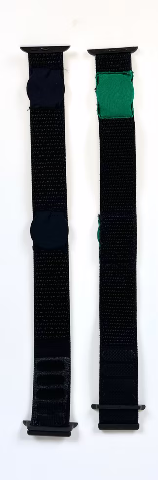 The two finished band halves — one showing the green RFID pouch sewn in