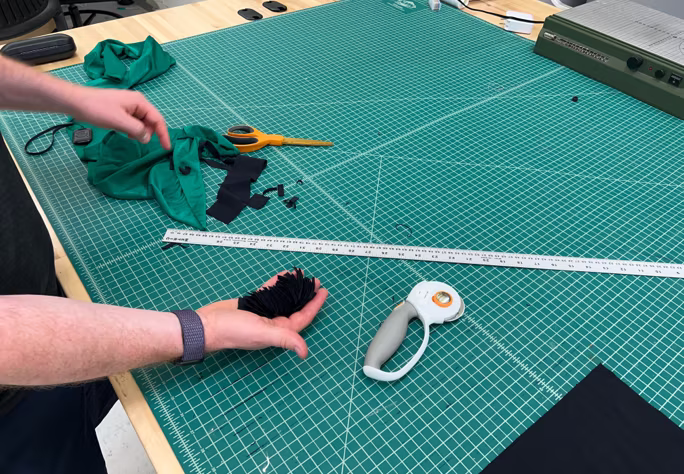Trimming nylon pieces to size on the cutting mat